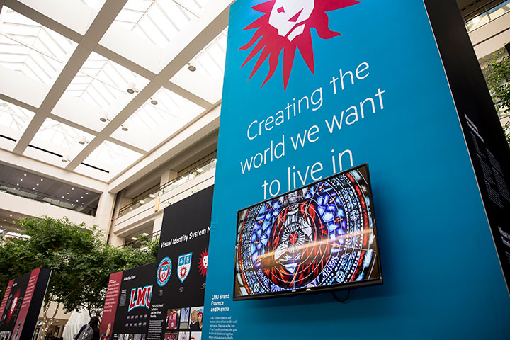 A large display exhibit showcasing the new visual identity