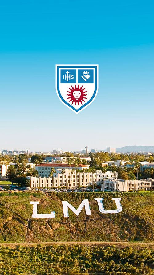 Aerial view of Xavier Hall and the LMU letters on the bluff with the LMU logo above