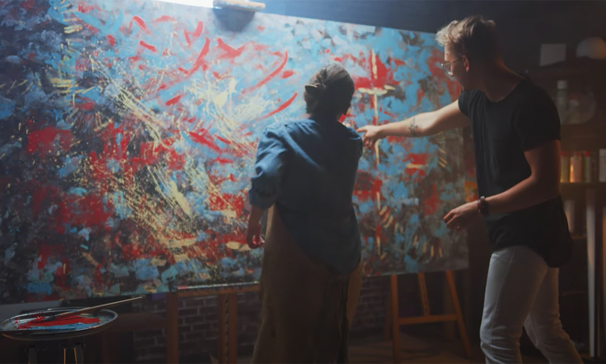 Two students painting